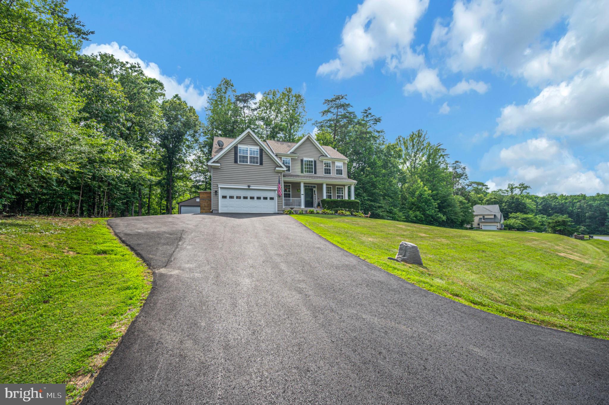 239 Toluca Road Stafford, VA 22556 - Photo 10 of 75 Charming home nestled in lush greenery.