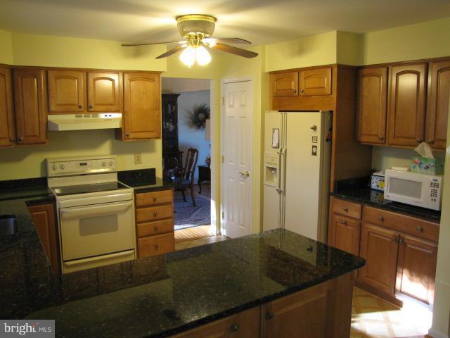 14013 Blenheim Road North Phoenix, MD 21131 - Photo 12 of 30 Spacious 12' x 11' Kitchen w/Ample Cabinet Storage