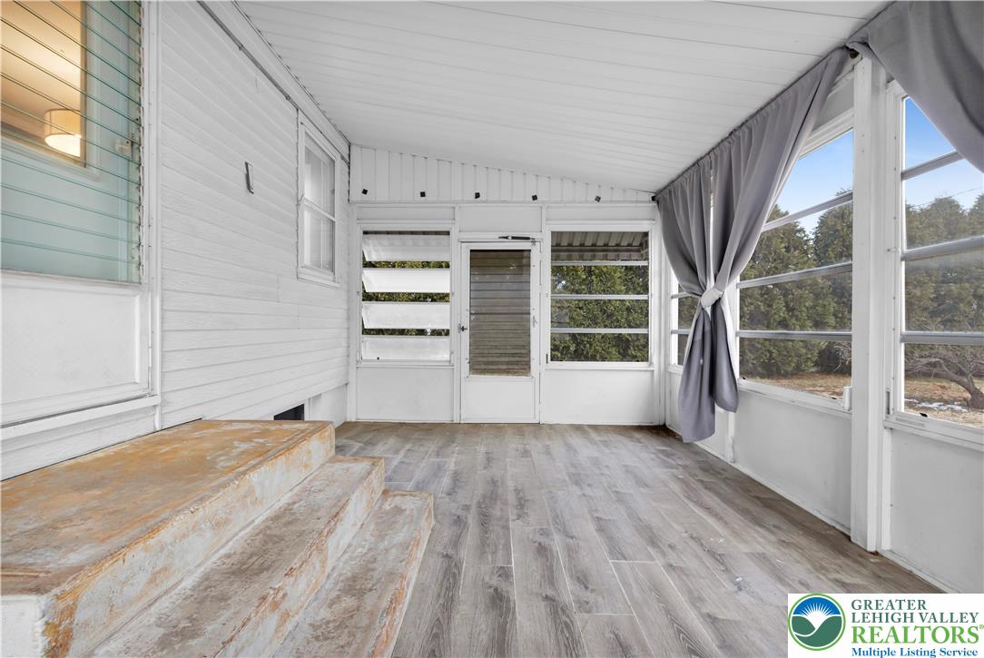 1942 Greenleaf Street Bethlehem, PA 18017 - Photo 30 of 41 a view of an empty room with a window and wooden floor