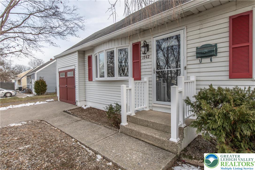 1942 Greenleaf Street Bethlehem, PA 18017 - Photo 3 of 41 a front view of a house with a yard and garage