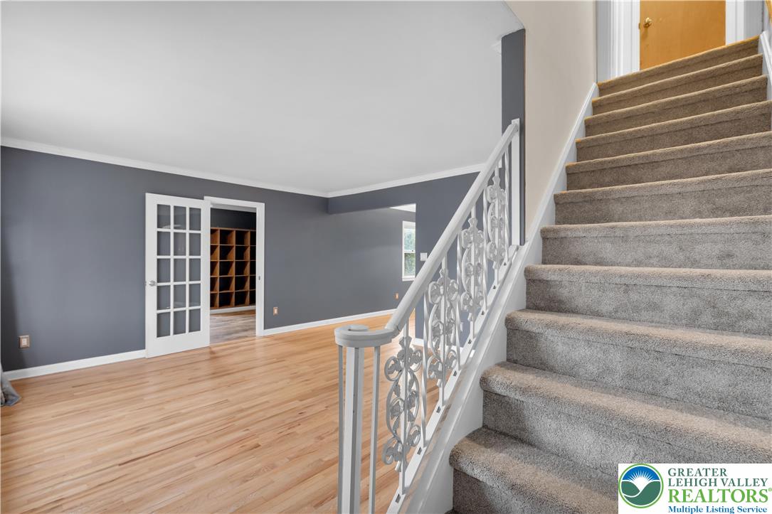 1942 Greenleaf Street Bethlehem, PA 18017 - Photo 4 of 41 a view of staircase with white walls and windows