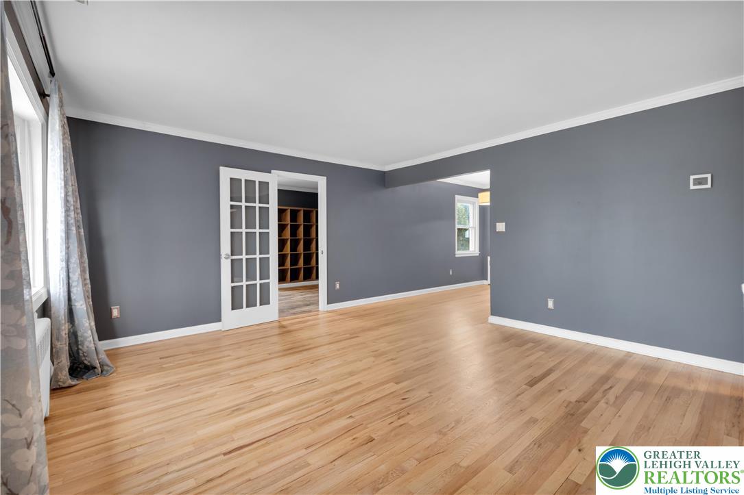 1942 Greenleaf Street Bethlehem, PA 18017 - Photo 5 of 41 a view of an empty room with wooden floor and a window