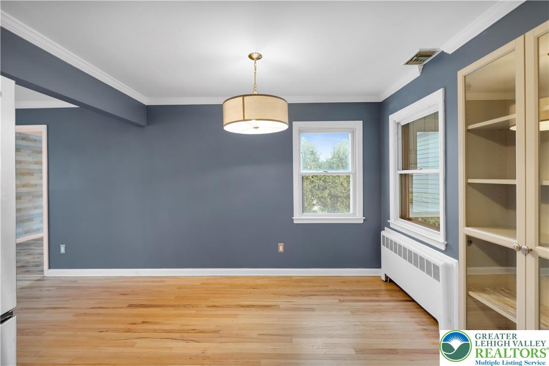 1942 Greenleaf Street Bethlehem, PA 18017 - Photo 9 of 41 a view of an empty room with wooden floor and a window