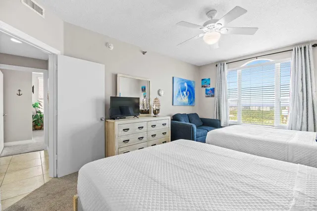 a view of a balcony dining area with furniture