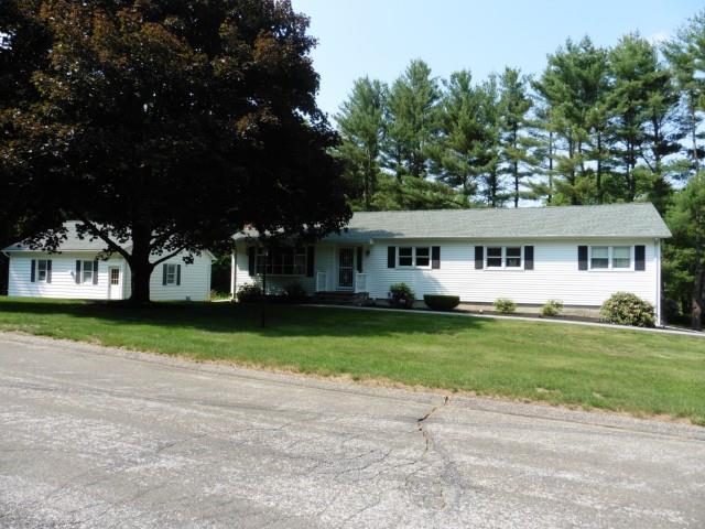 175 Booth Hill Road Shelton, CT 06484 - Photo 1 of 1 a front view of a house with a yard and trees