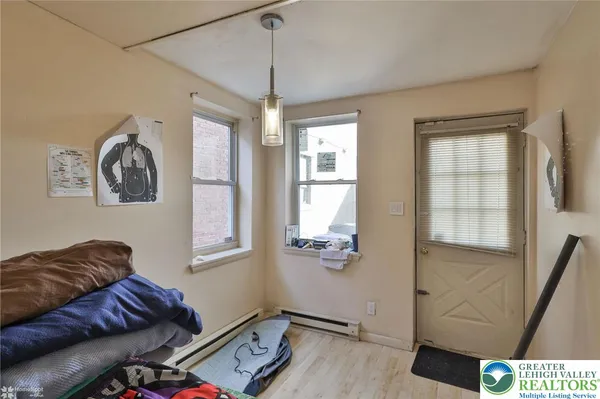 a view of a room with furniture and toys