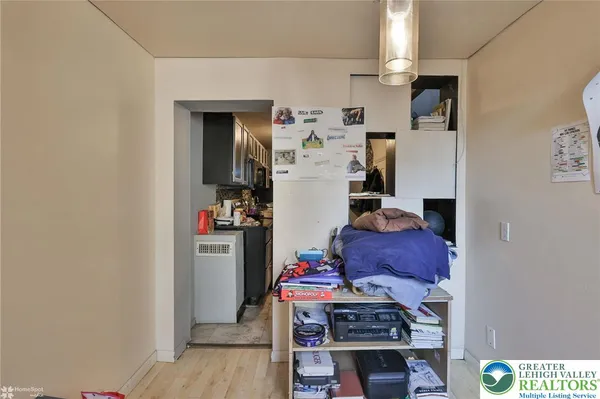a room with furniture and wooden floor