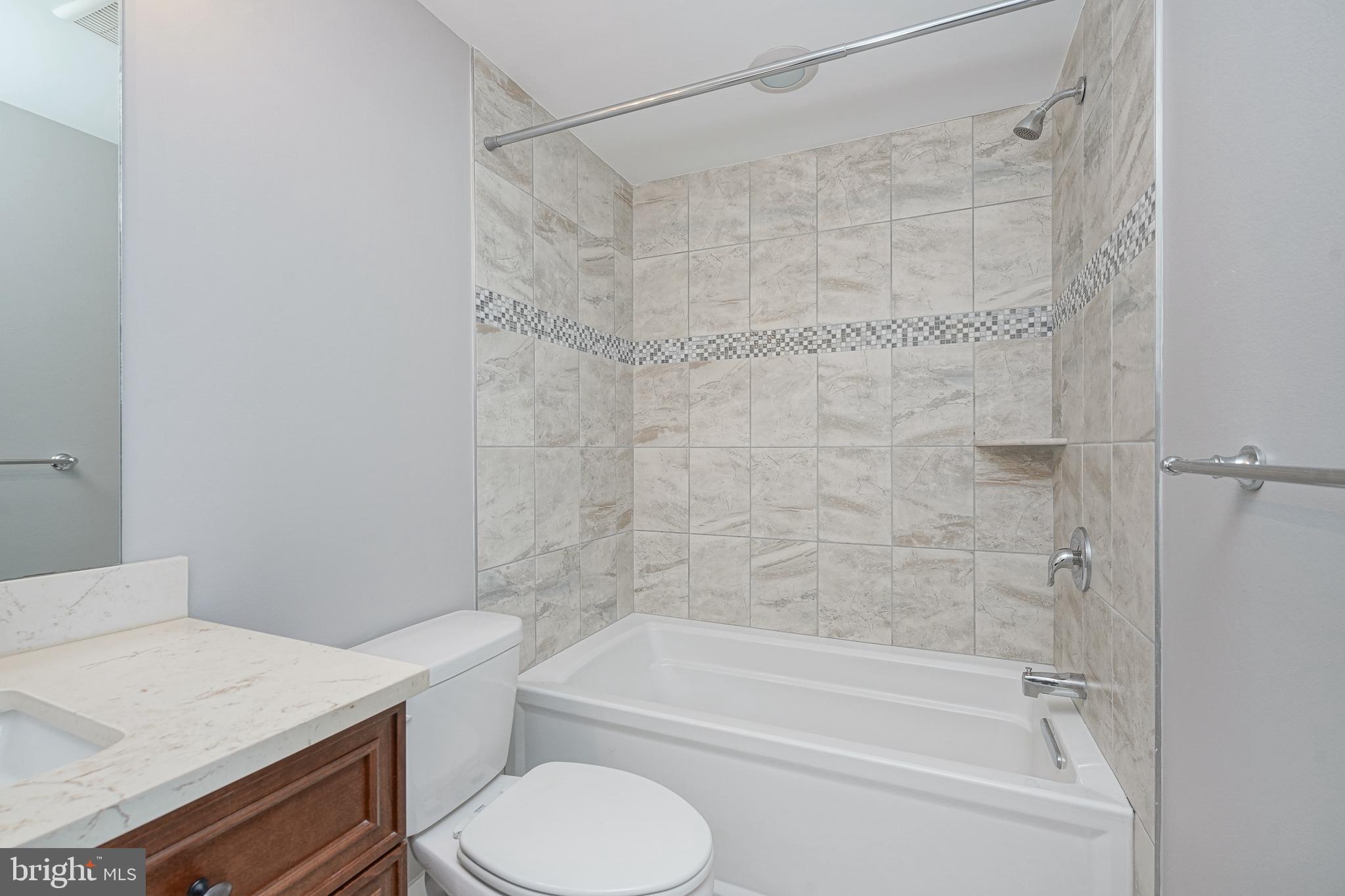 1011 Germantown Avenue, Unit B Philadelphia, PA 19123 - Photo 16 of 34 a bathroom with a sink a toilet and a bathtub