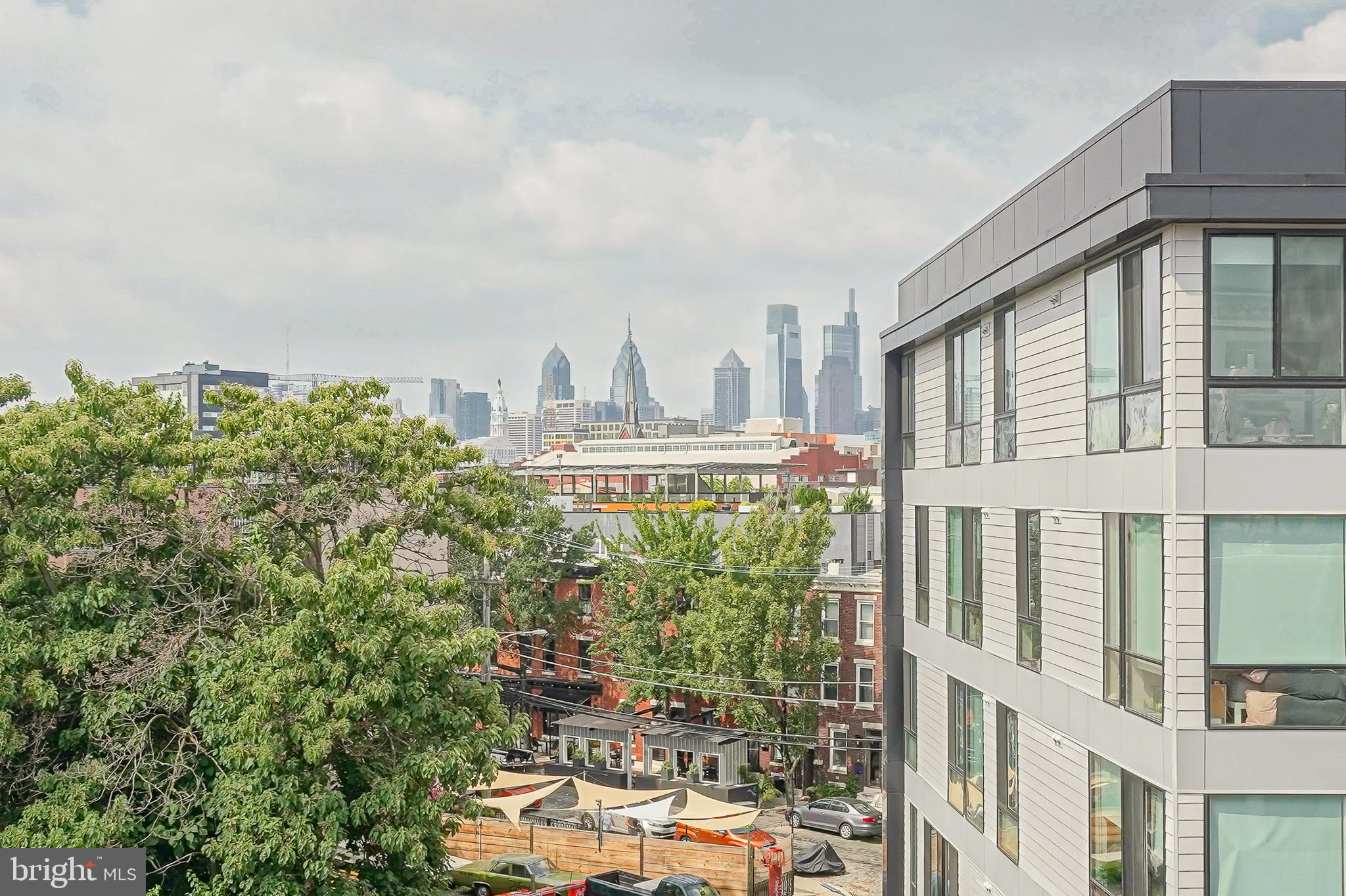 1011 Germantown Avenue, Unit B Philadelphia, PA 19123 - Photo 20 of 34 a front view of a building with outdoor space and garden