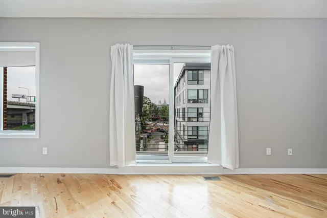 a view of a room that has a window in it