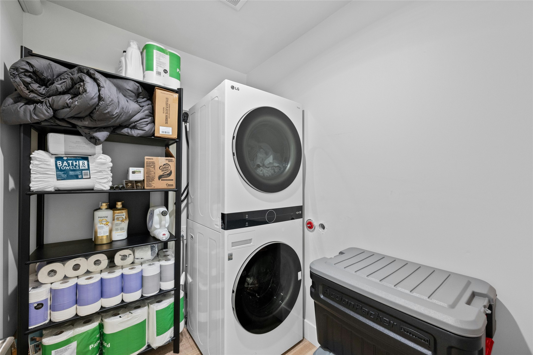 2201 Leon Street, Unit D Austin, TX 78705 - Photo 20 of 24 Laundry room with stacked washer and dryer
