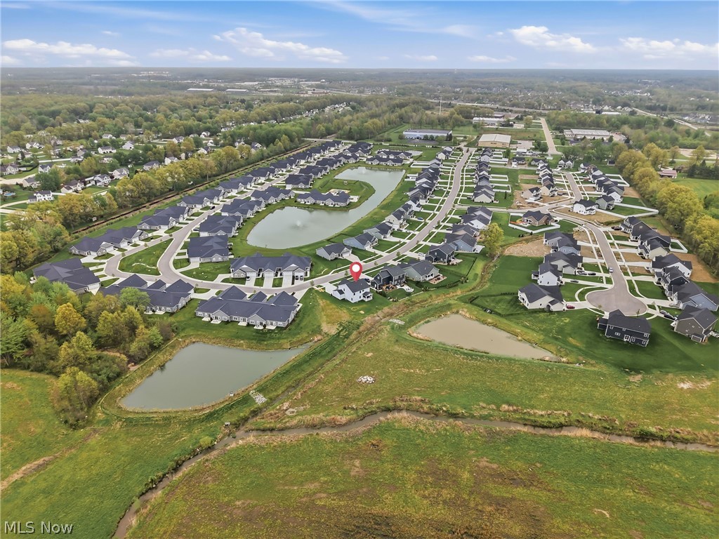 5358 Walnut Rdg Lane Sheffield Lake, OH 44054 - Photo 47 of 50 Aerial panorama of a residential community featuring multiple ponds and a network of paved roads