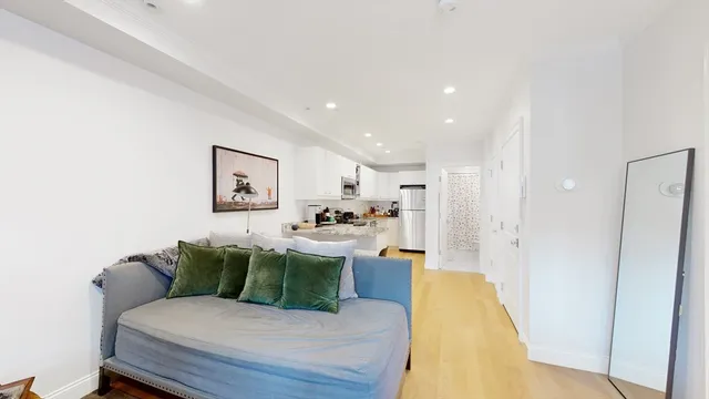 a living room with furniture and a table