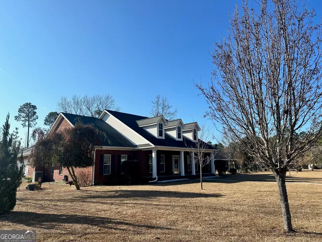 a view of a house with a park
