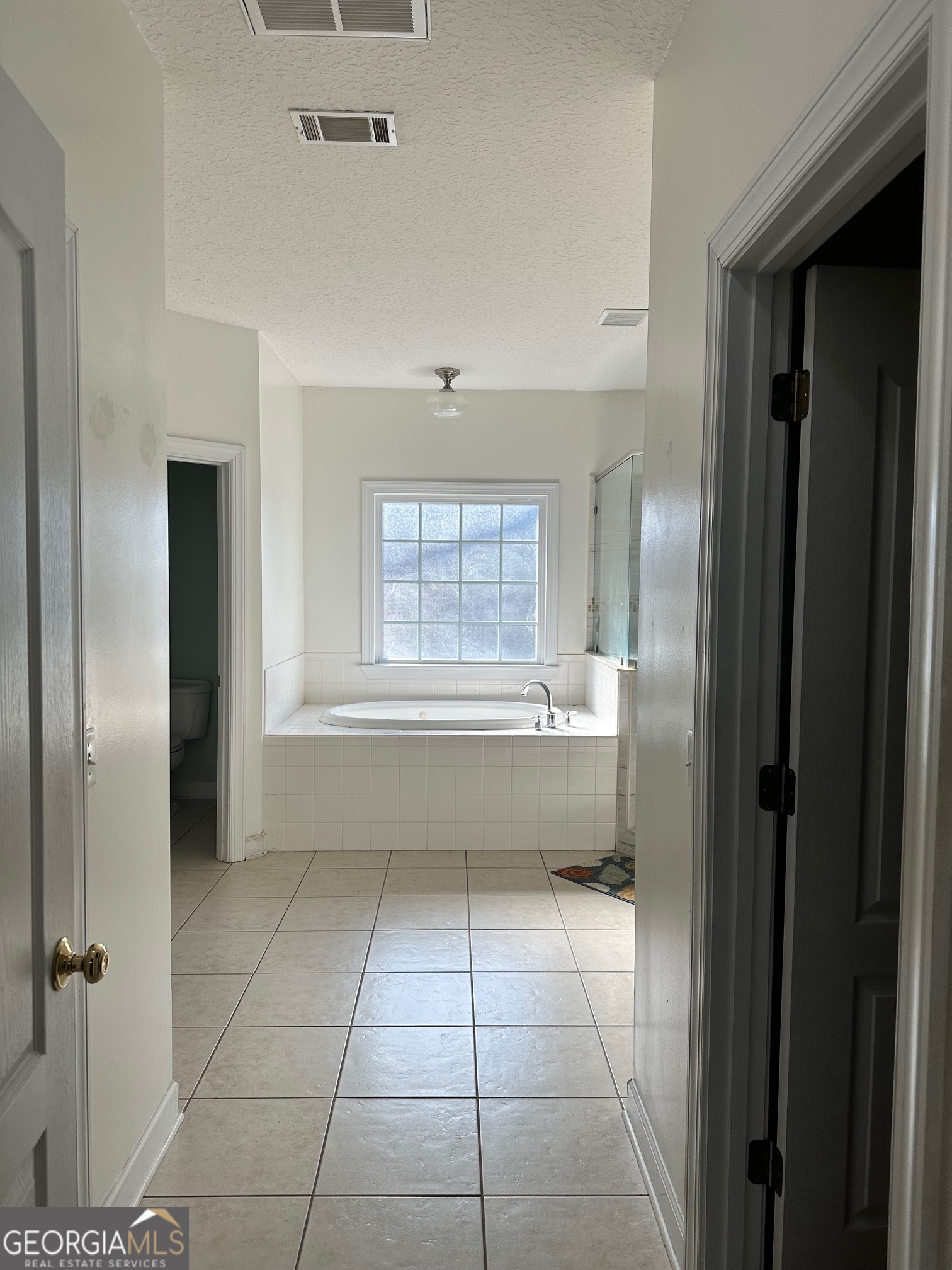 605 Patrick Way Statesboro, GA 30458 - Photo 33 of 58 a view of an empty room and window