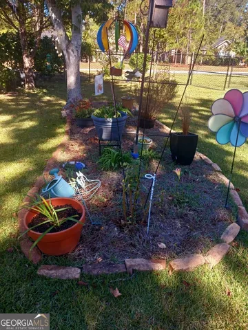 a view of yard with tree s