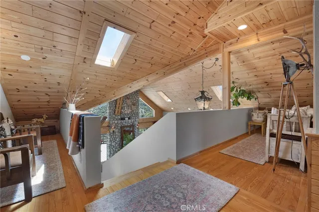 a view of living room kitchen and entryway