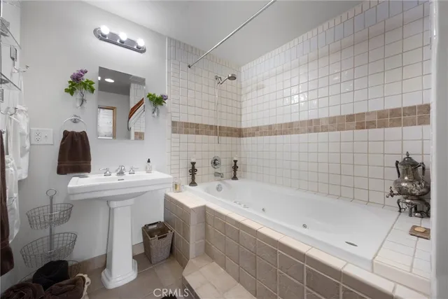 a bedroom with furniture and window