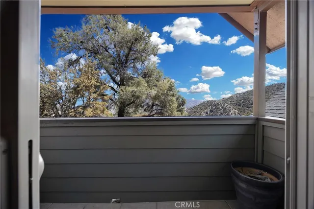 a view of a backyard with a tv