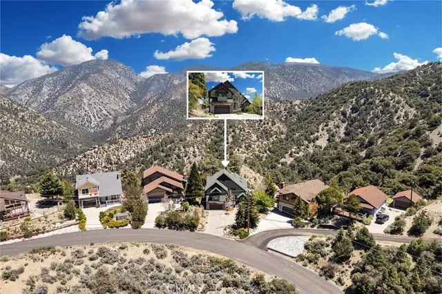 a view of a lake with a sitting space