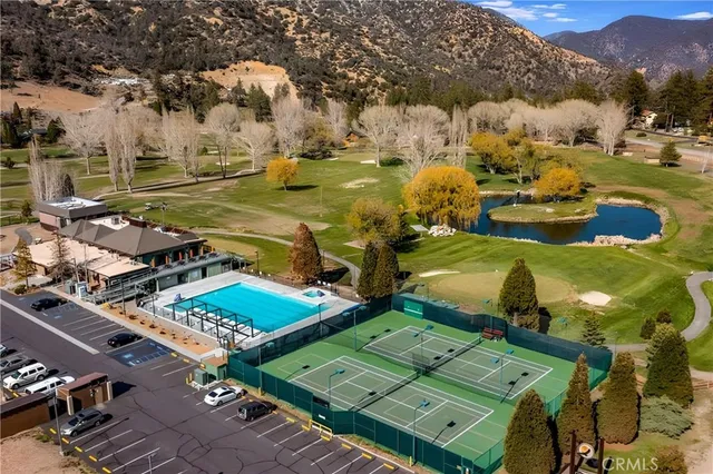 a view of swimming pool from a balcony