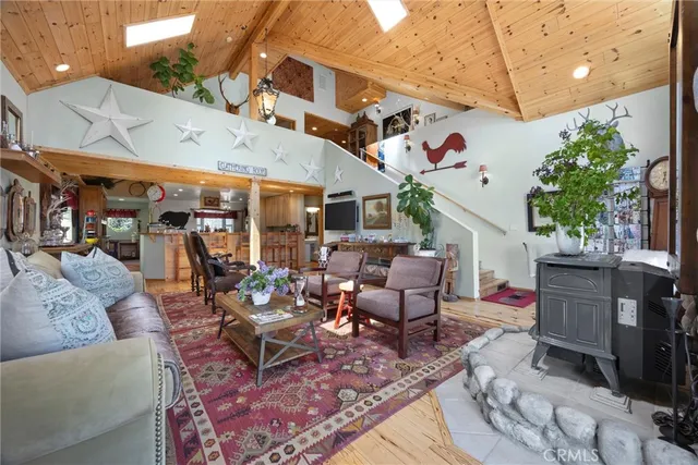 a view of a patio with table and chairs potted plants