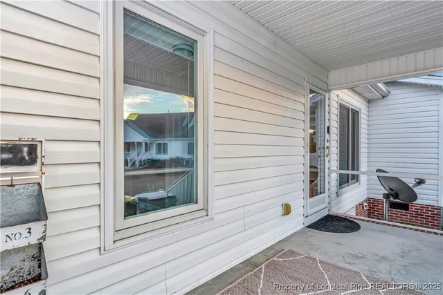a view of a door and a chair
