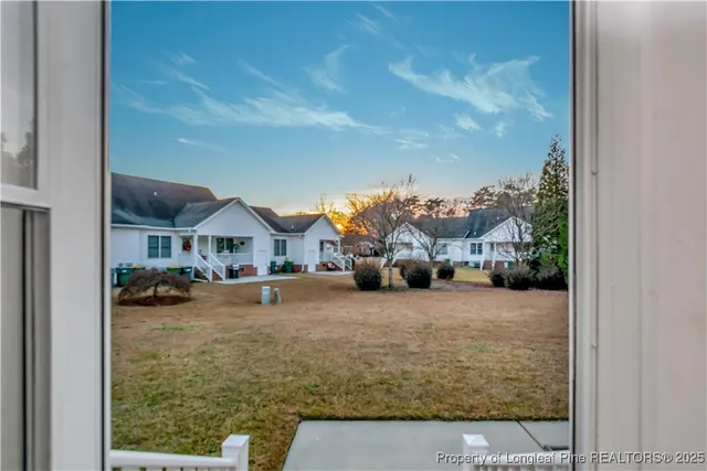 a view of a street with cars