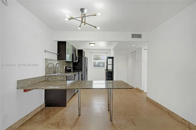 $265,000 | 15801 West Waterside Circle, Unit 101, Sunrise, FL 33326