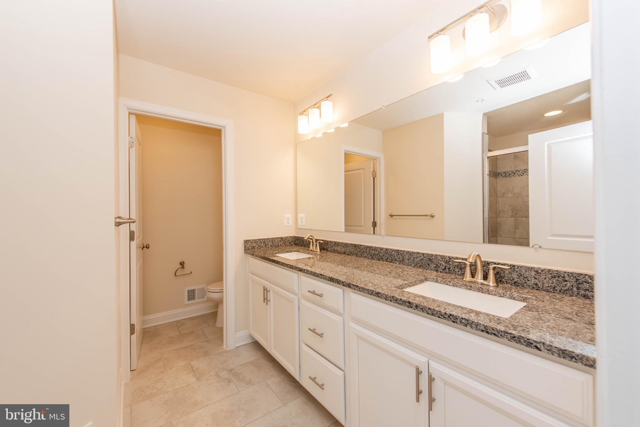 7007 Whitson Way Hanover, MD 21076 - Photo 16 of 31 Owner's Bathroom