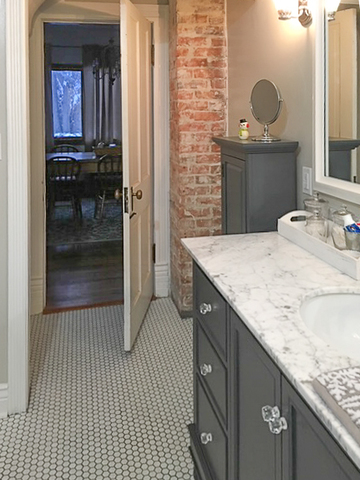 3365 Hermann Road Lee, IL 60530 - Photo 26 of 63 a bathroom with a granite countertop sink a mirror and shower