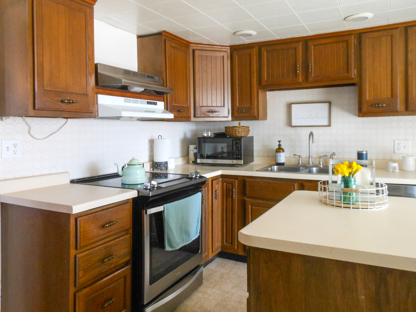 3365 Hermann Road Lee, IL 60530 - Photo 7 of 63 a kitchen with stainless steel appliances granite countertop a sink a stove and cabinets