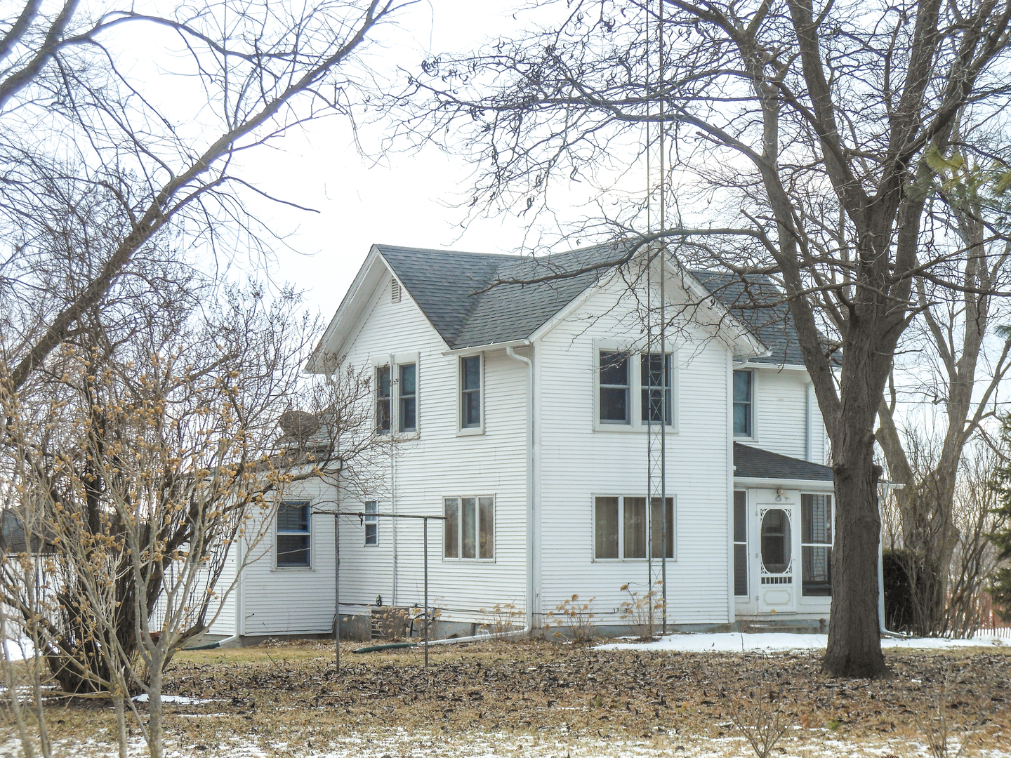 3365 Hermann Road Lee, IL 60530 - Photo 62 of 63 a view of a white house with a large tree
