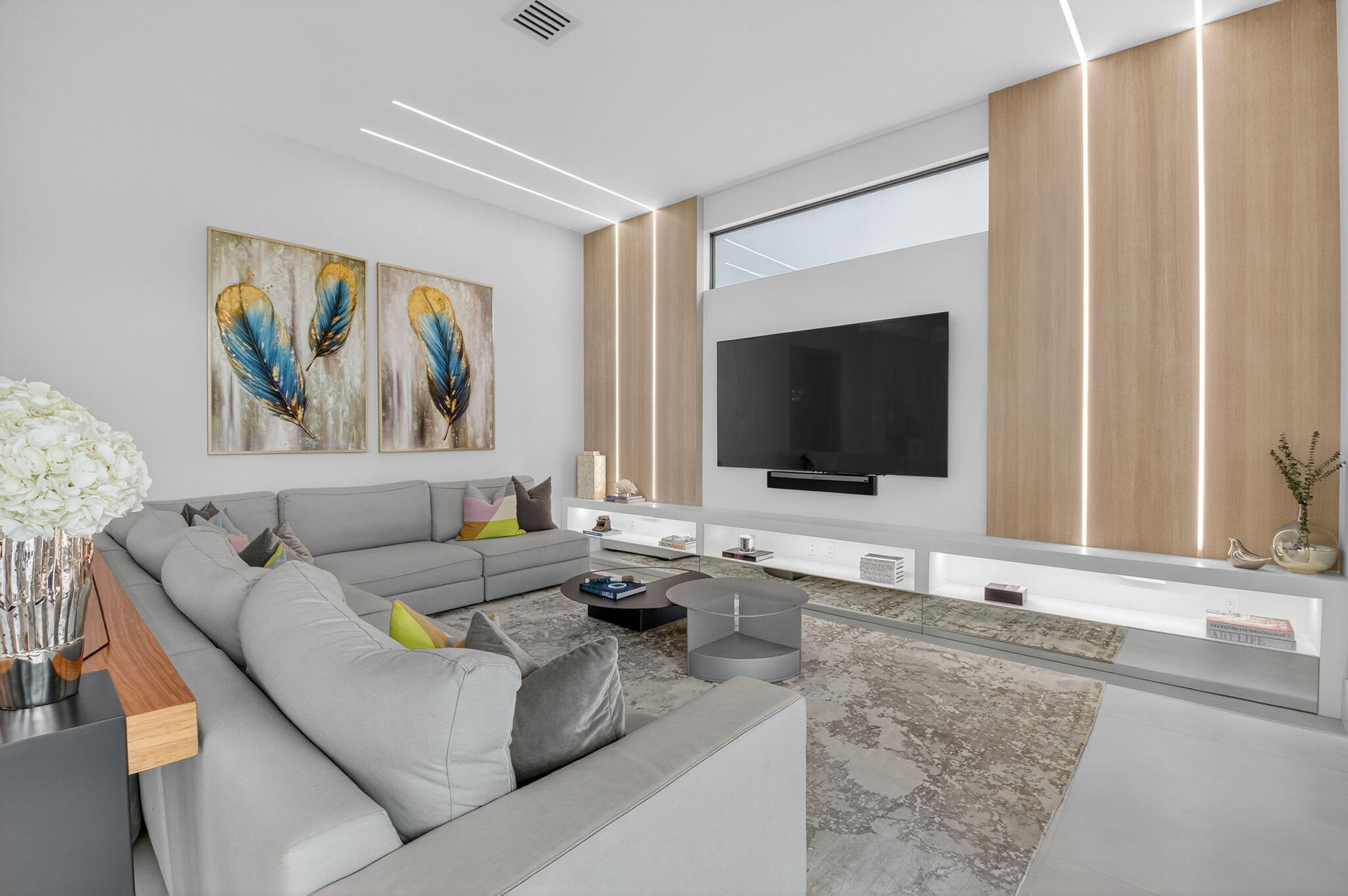 9083 Benedetta Place Boca Raton, FL 33496 - Photo 19 of 112 a living room with furniture and a flat screen tv