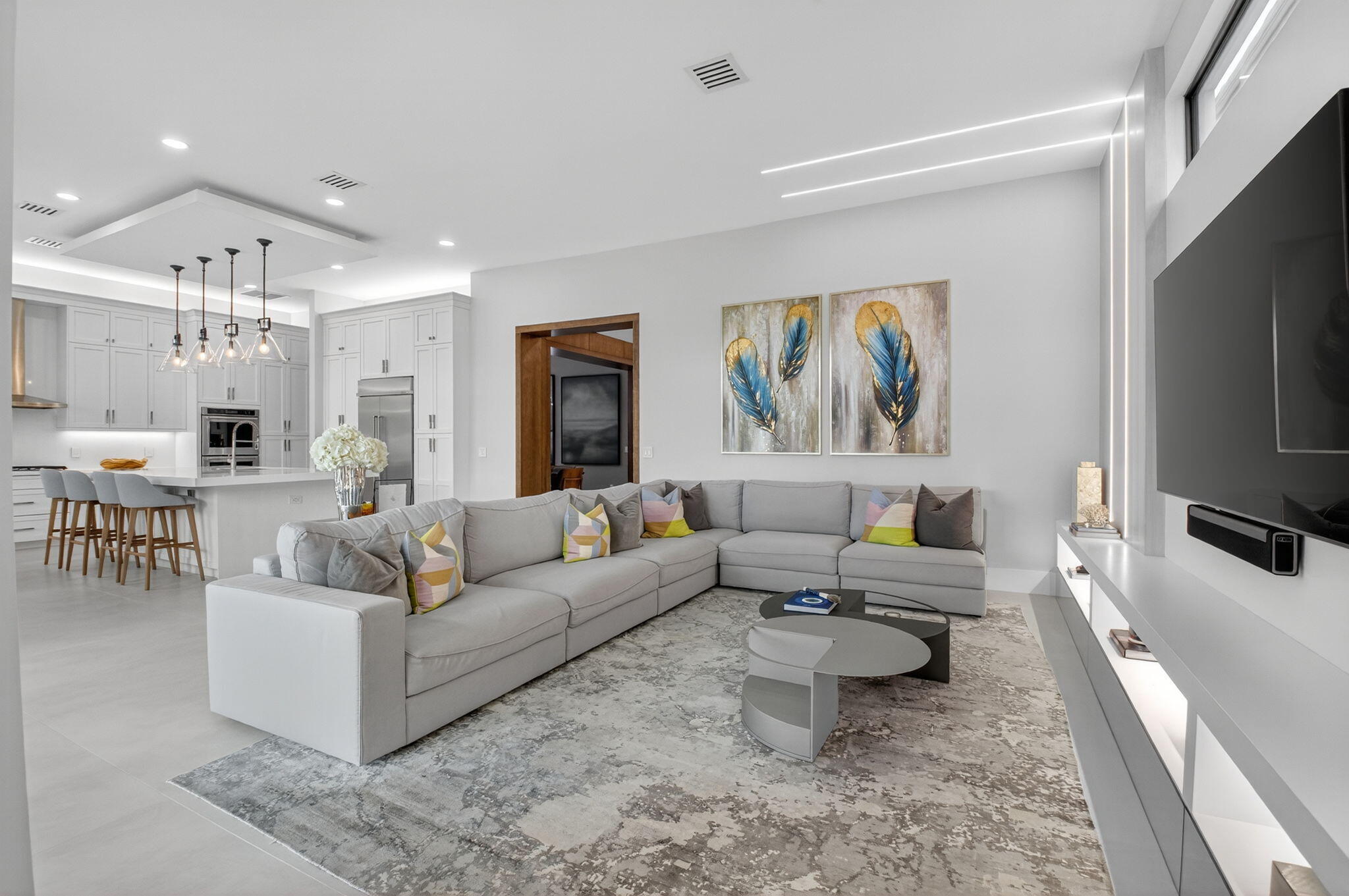 9083 Benedetta Place Boca Raton, FL 33496 - Photo 20 of 112 a living room with furniture and a flat screen tv