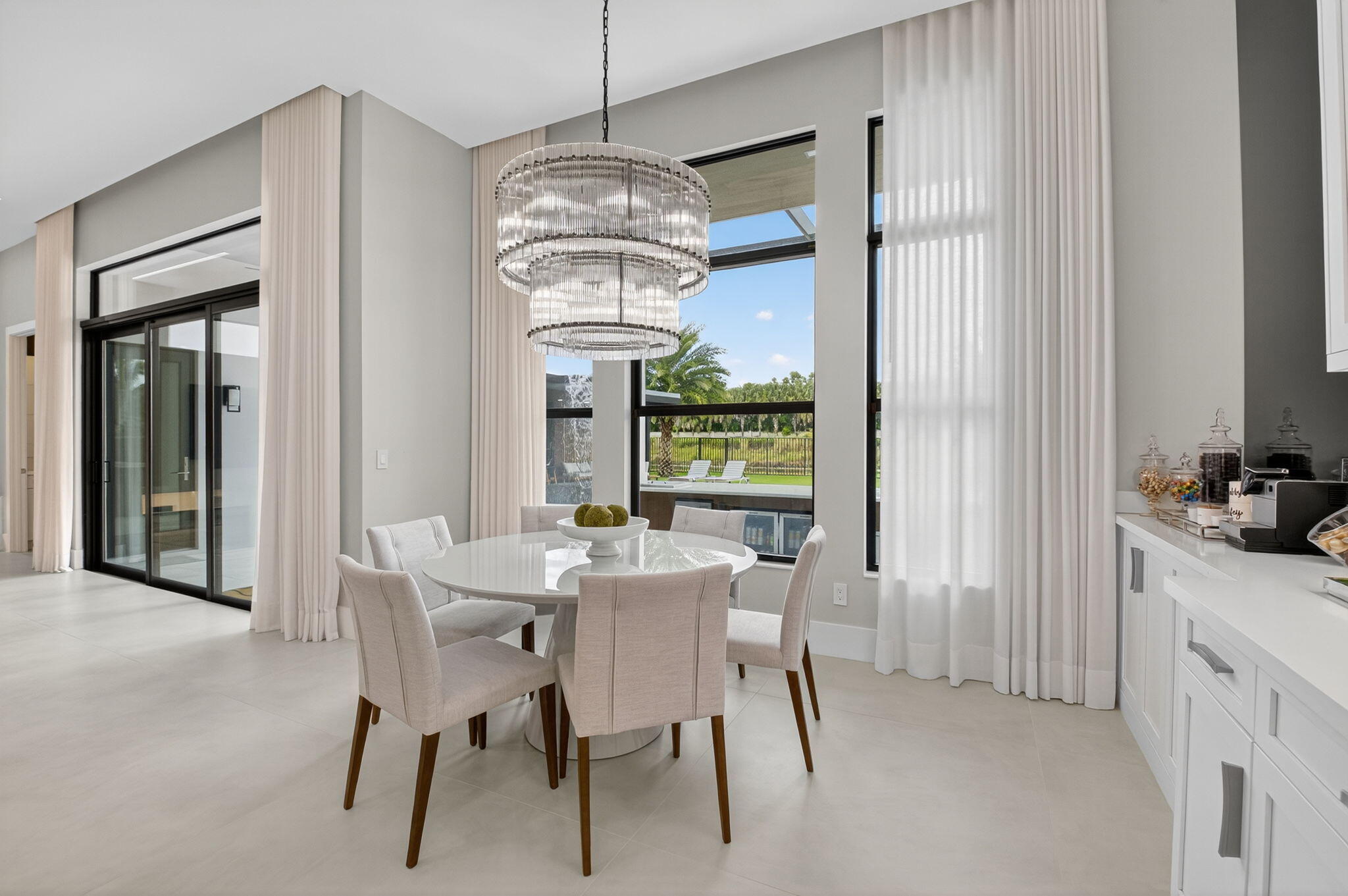 9083 Benedetta Place Boca Raton, FL 33496 - Photo 23 of 112 a view of a dining room with furniture window and outside view