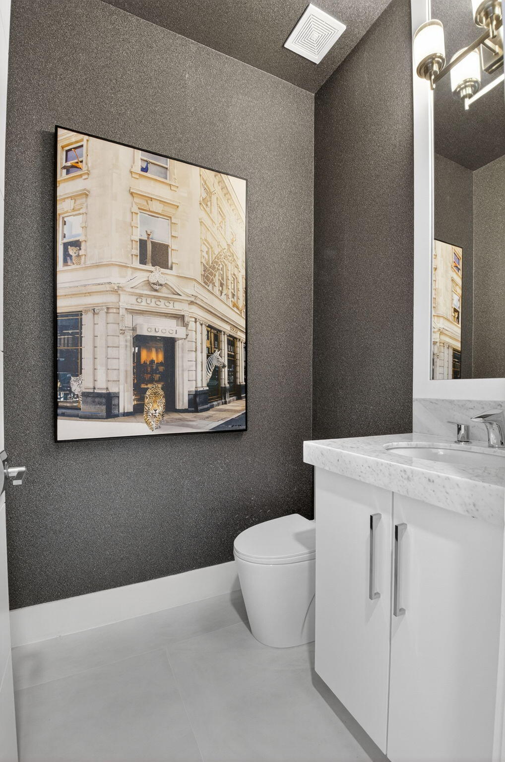 9083 Benedetta Place Boca Raton, FL 33496 - Photo 37 of 112 a bathroom with a sink vanity and toilet