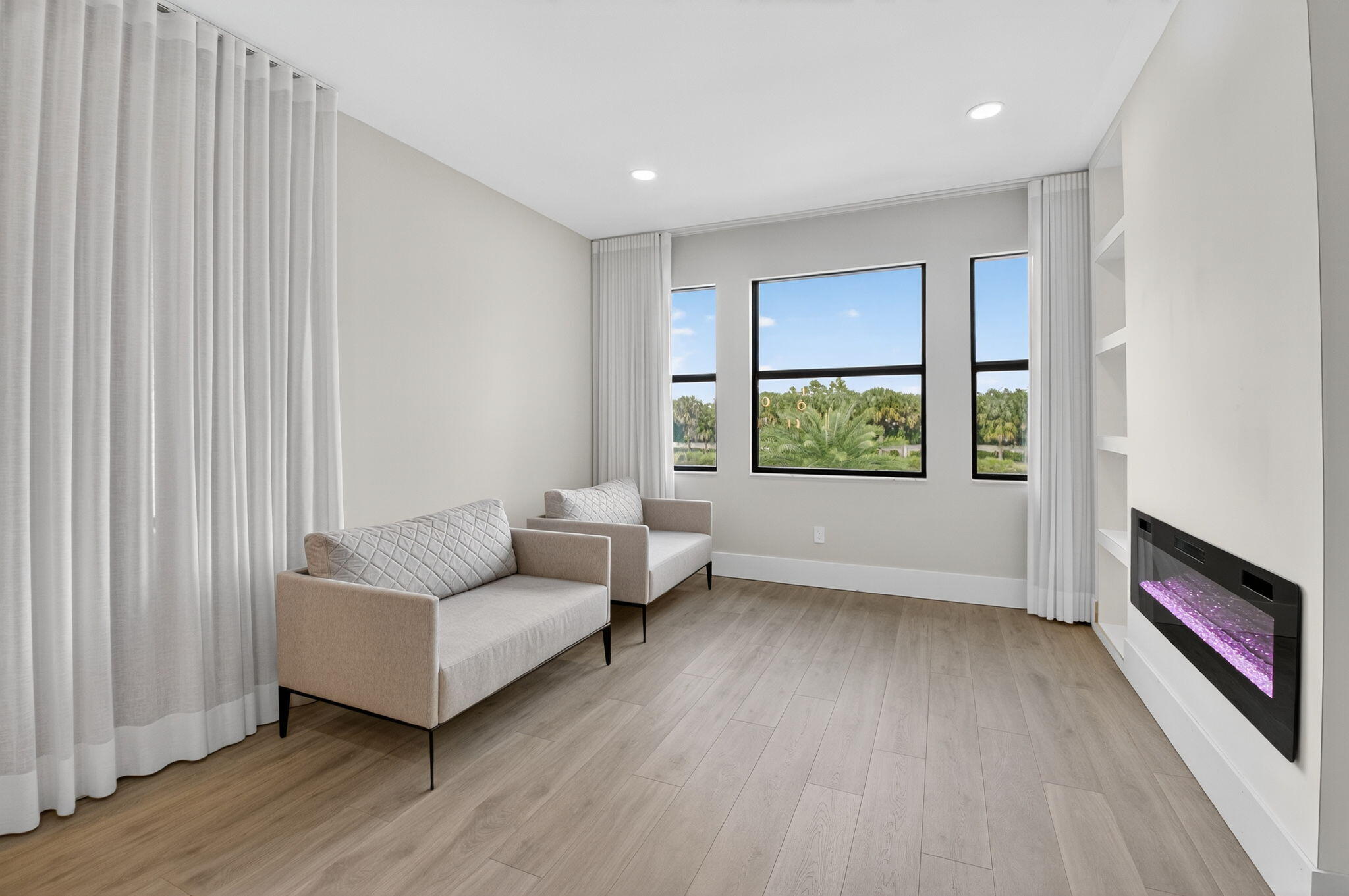 9083 Benedetta Place Boca Raton, FL 33496 - Photo 43 of 112 a living room with furniture and a window