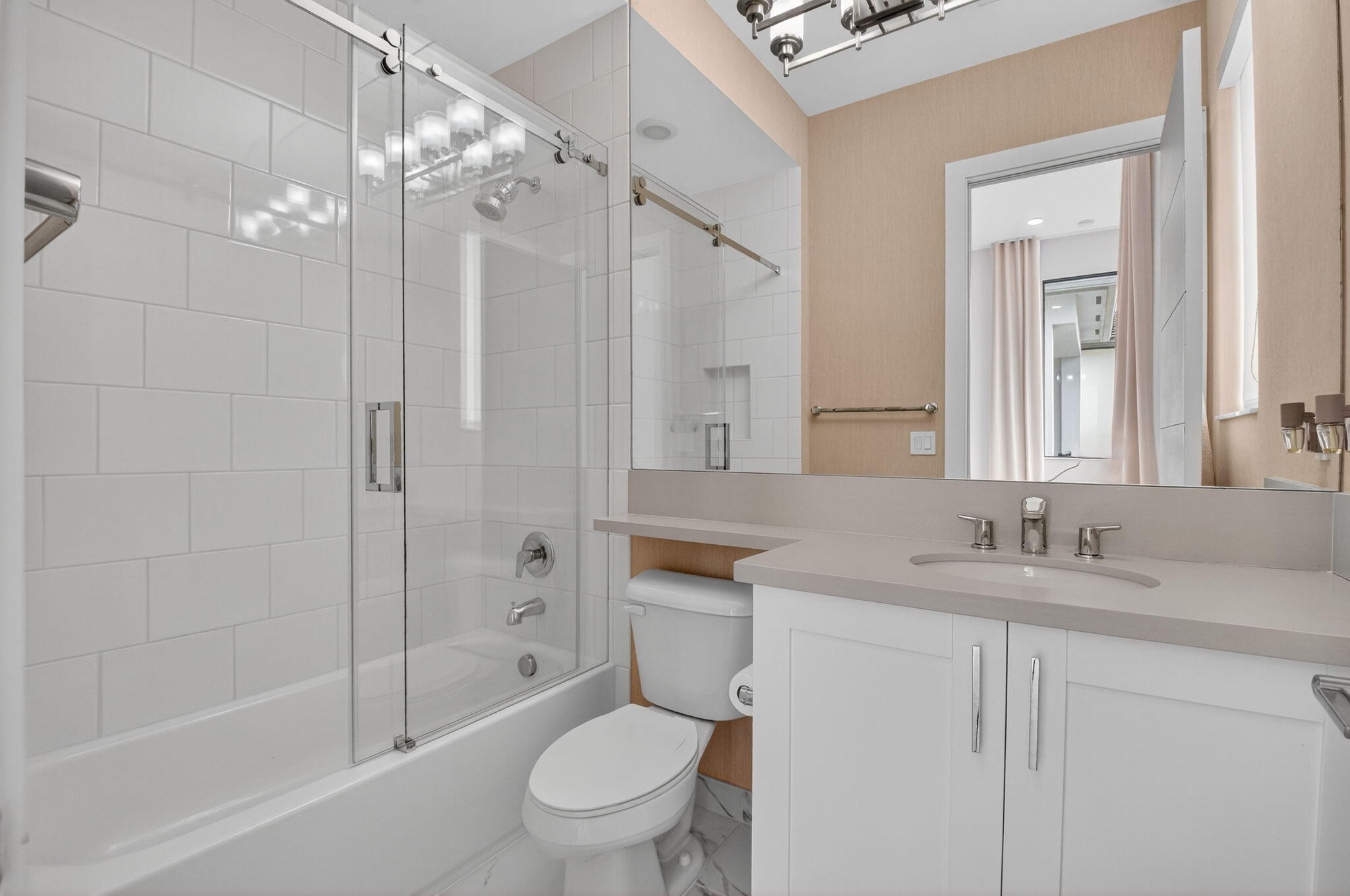 9083 Benedetta Place Boca Raton, FL 33496 - Photo 49 of 112 a bathroom with a sink a toilet and shower