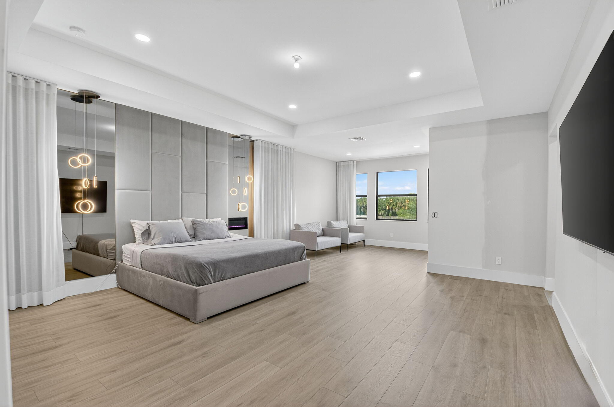 9083 Benedetta Place Boca Raton, FL 33496 - Photo 54 of 112 a living room with furniture and a wooden floor