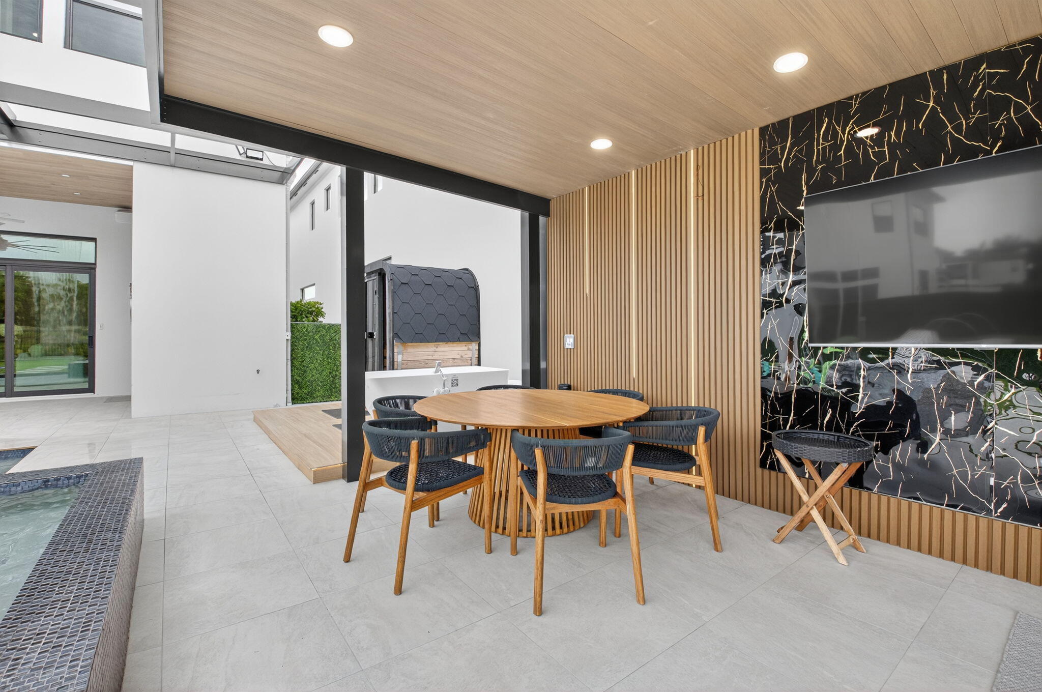 9083 Benedetta Place Boca Raton, FL 33496 - Photo 65 of 112 a dining room with furniture and a floor to ceiling window