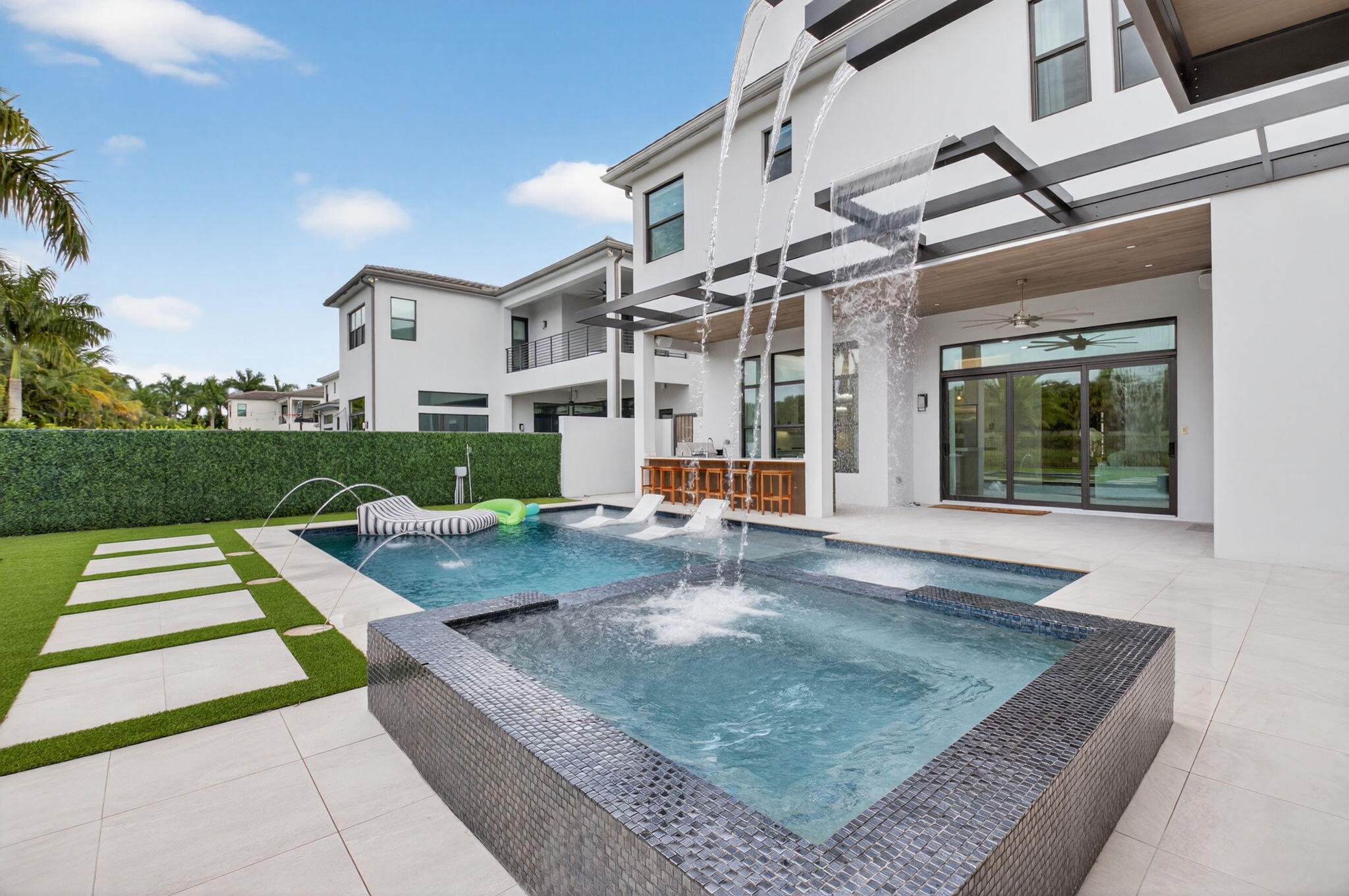9083 Benedetta Place Boca Raton, FL 33496 - Photo 68 of 112 a front view of a house with a garden