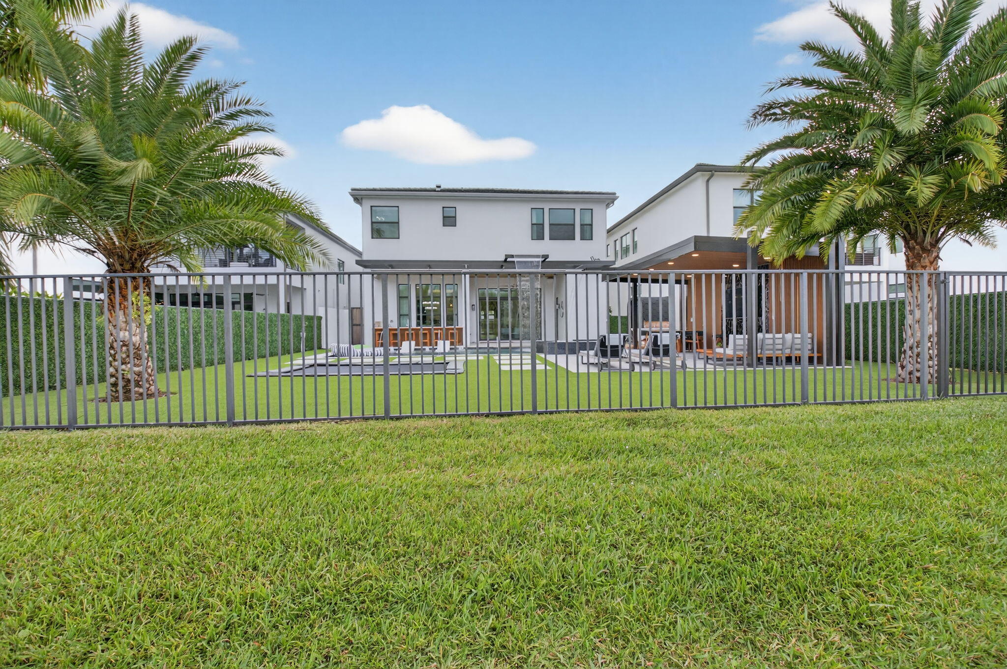 9083 Benedetta Place Boca Raton, FL 33496 - Photo 72 of 112 a view of a garden and a fence
