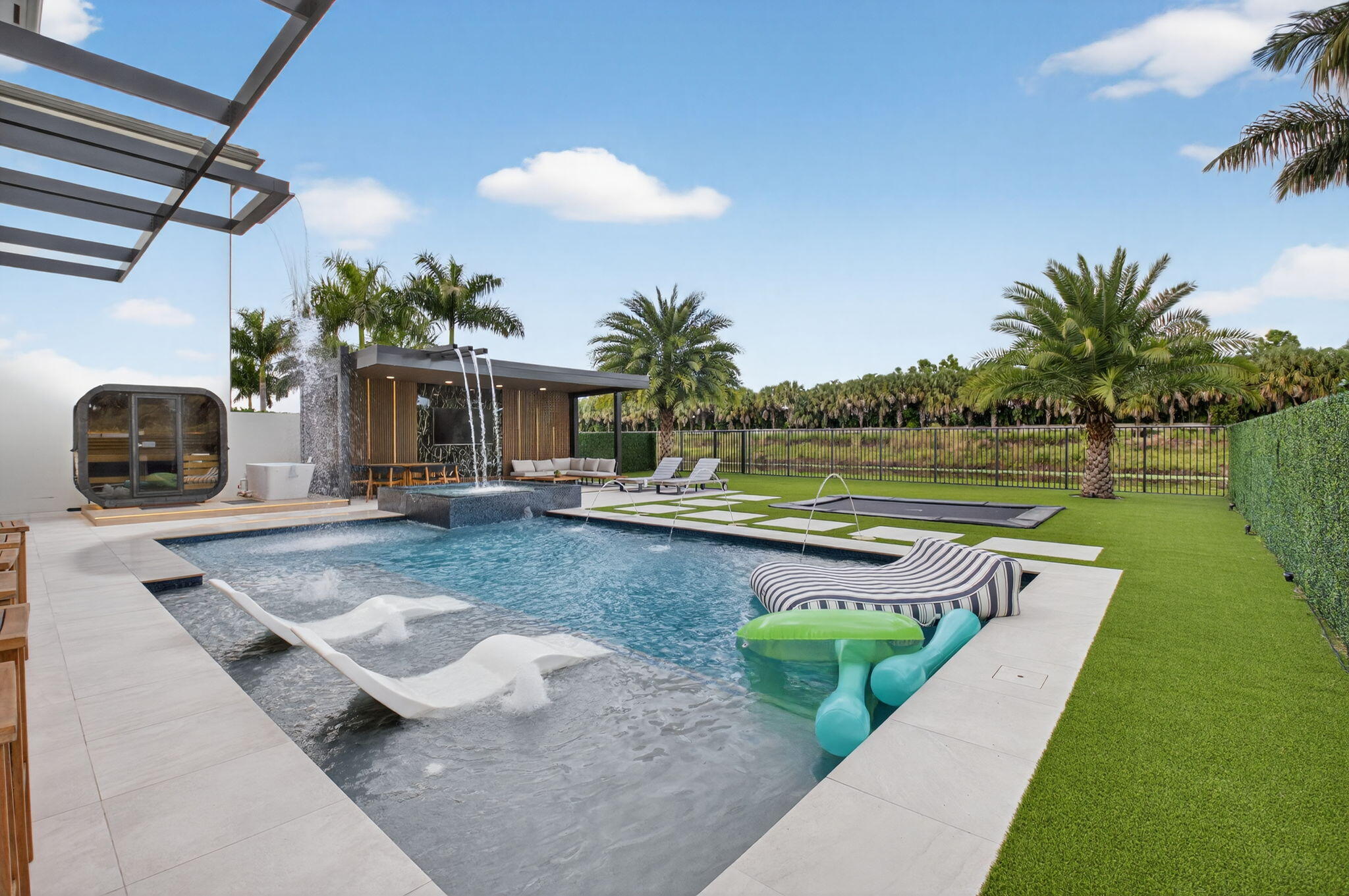 9083 Benedetta Place Boca Raton, FL 33496 - Photo 76 of 112 a view of a swimming pool with a patio and a yard