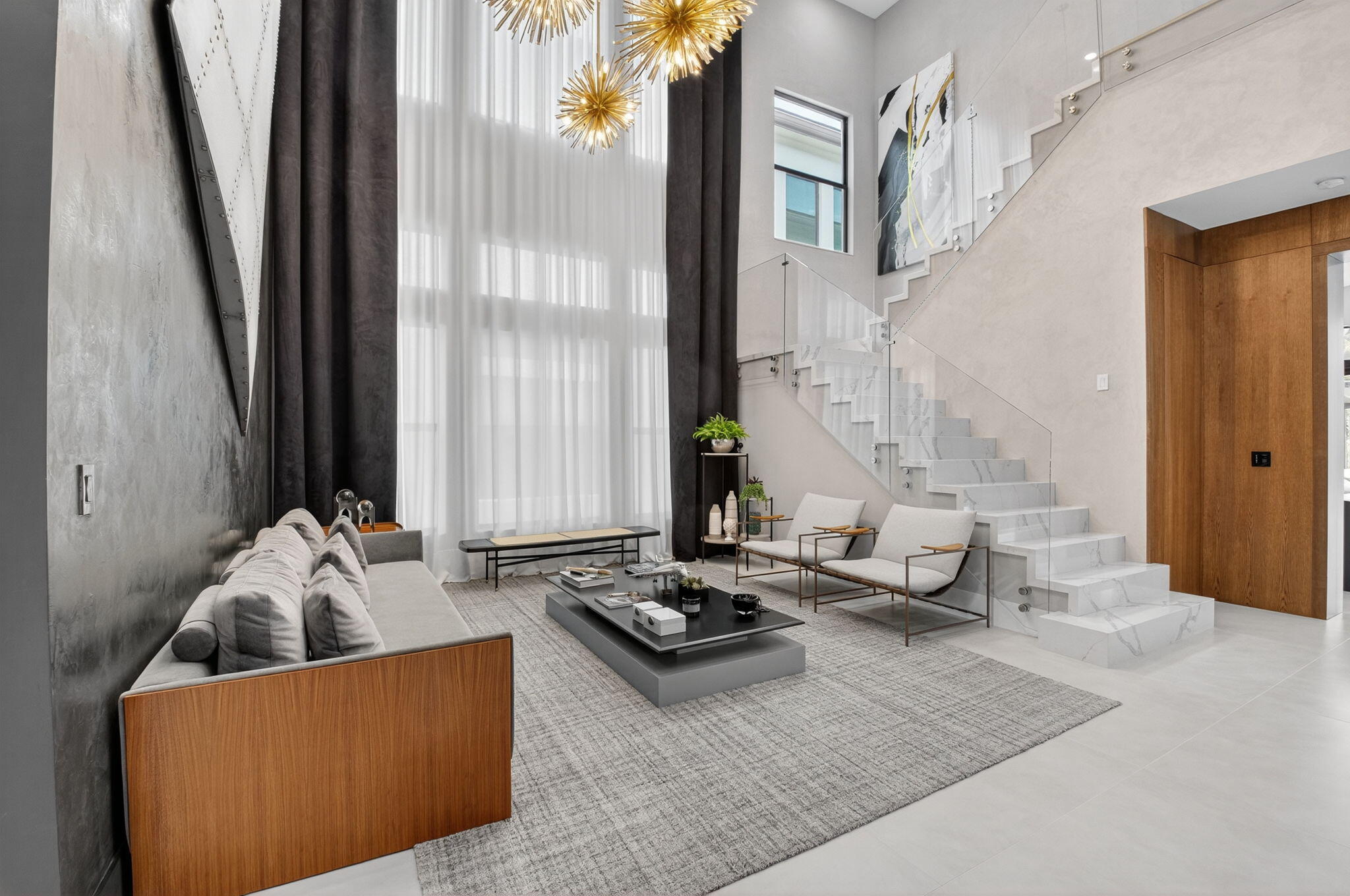 9083 Benedetta Place Boca Raton, FL 33496 - Photo 10 of 112 a living room with furniture and a large window