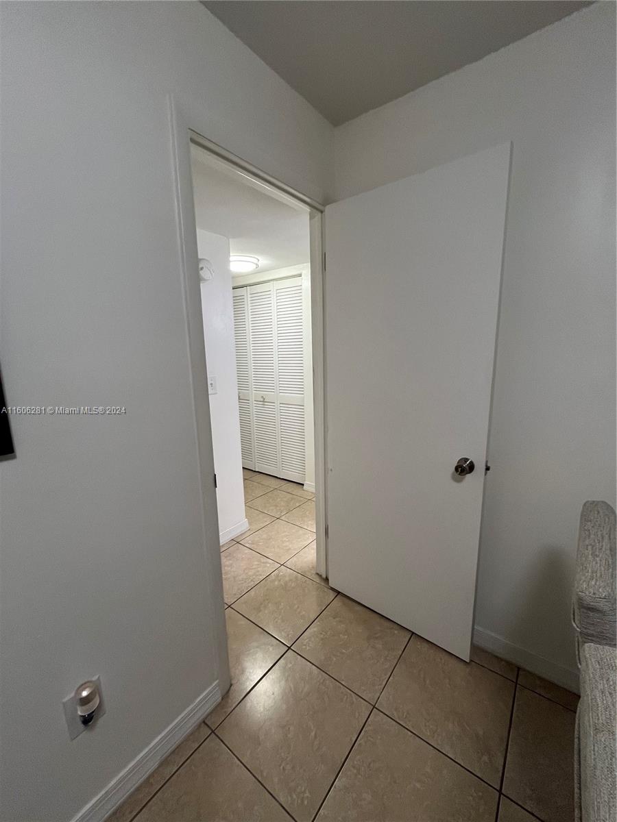 3490 Foxcroft Road, Unit B107 Miramar, FL 33025 - Photo 18 of 32 a view of a hallway