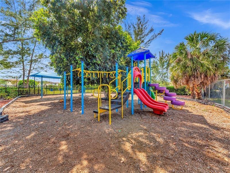 3490 Foxcroft Road, Unit B107 Miramar, FL 33025 - Photo 31 of 32 a view of a park with slide