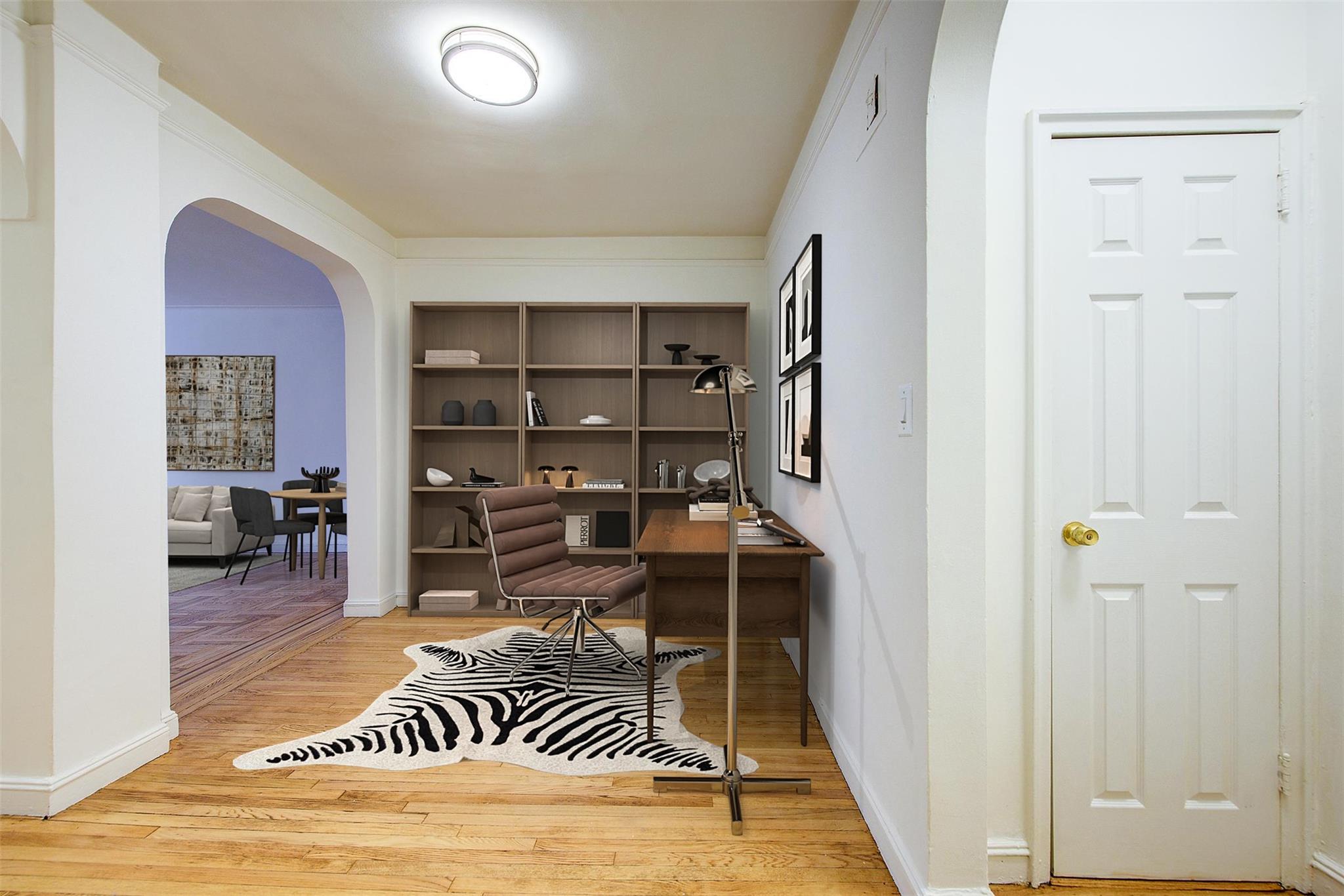 110-31 73rd Road, Unit 4C Queens, NY 11375 - Photo 1 of 1 a view of livingroom with furniture and closet