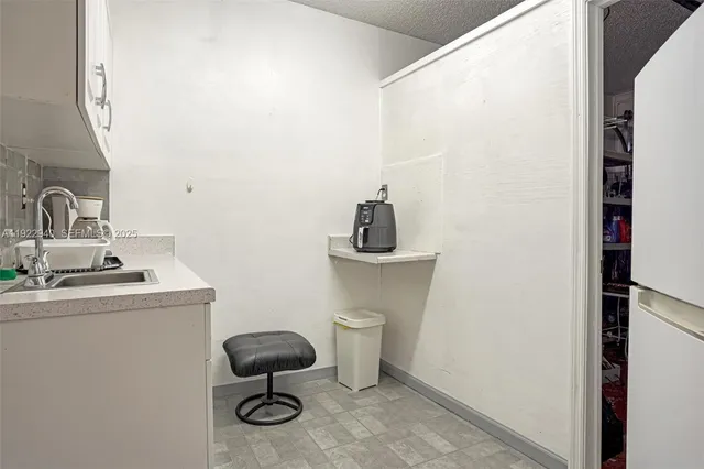 a bathroom with a toilet a sink and a window