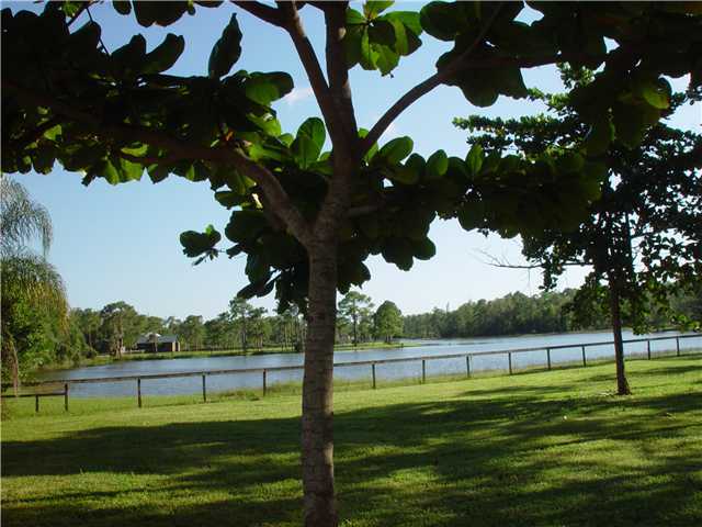 5475 Reynolds Road Lake Worth, FL 33449 - Photo 8 of 9 a view of a golf course with a lake view